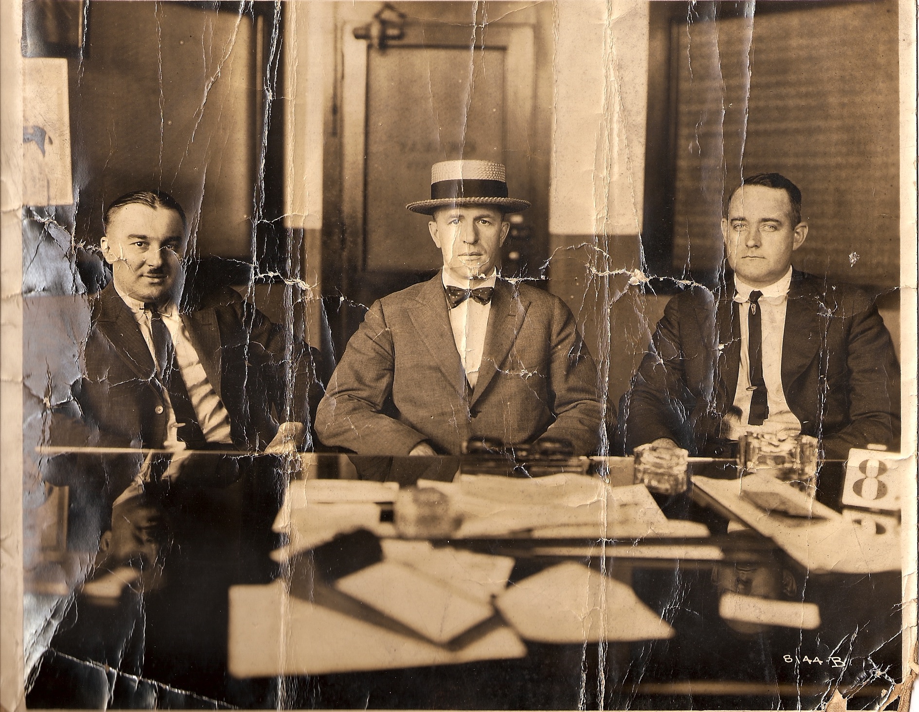 Thomas B. Hogan of the Yellow Cab Company, Chicago Illinois is seated at the center of the photograph. 